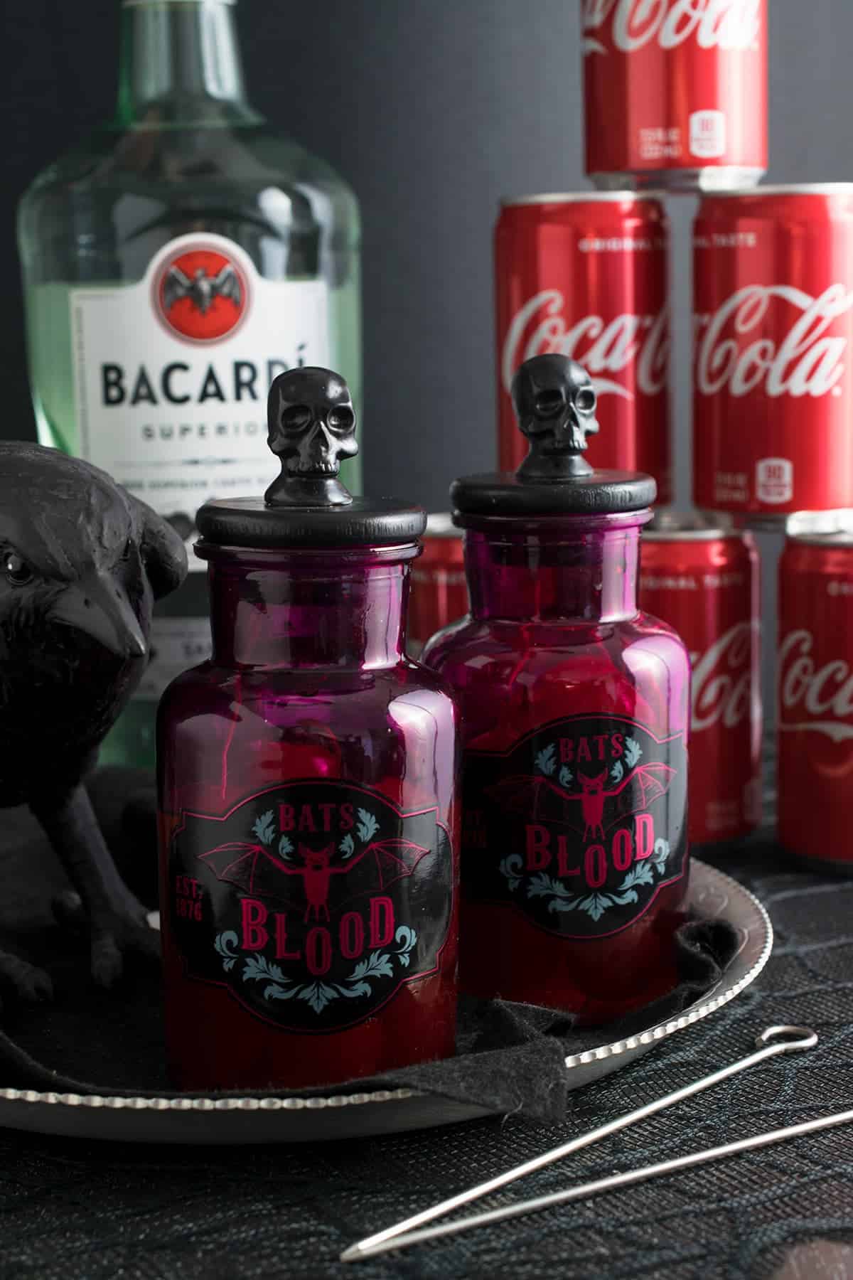 Halloween Party Cocktail Tray with festive bats blood labelled cherry jars.