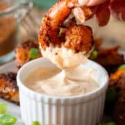Cajun blackened shrimp dipped in remoulade sauce.