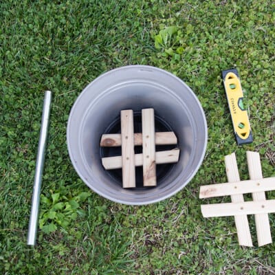 Top down photo of wood braces inside a planter pot.