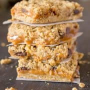 Oatmeal Carmelita bars stacked on top of each other.