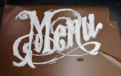 Stenciling a menu chalkboard