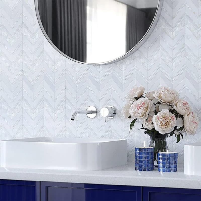 White Chevron tile in a bathroom.