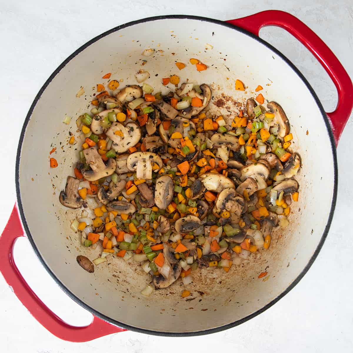 Sauteed vegetables after cooking in an enamel Dutch oven.