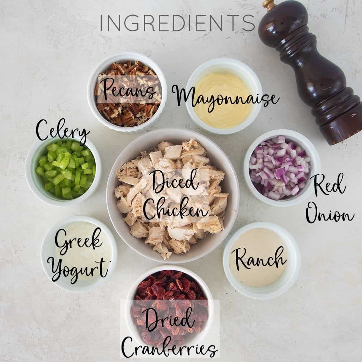 Ingredients for chicken salad with text labels.