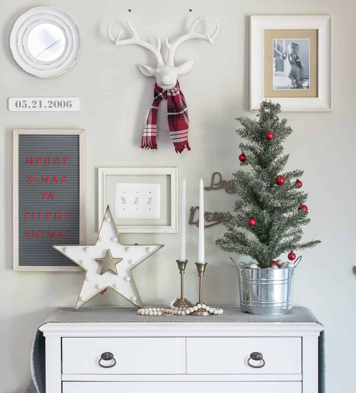 Christmas themed wall decor with red, white, and green color scheme.