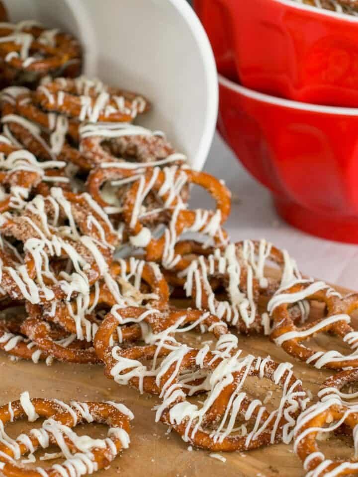 Cinnamon sugar pretzels closeup with white chocolate drizzle.