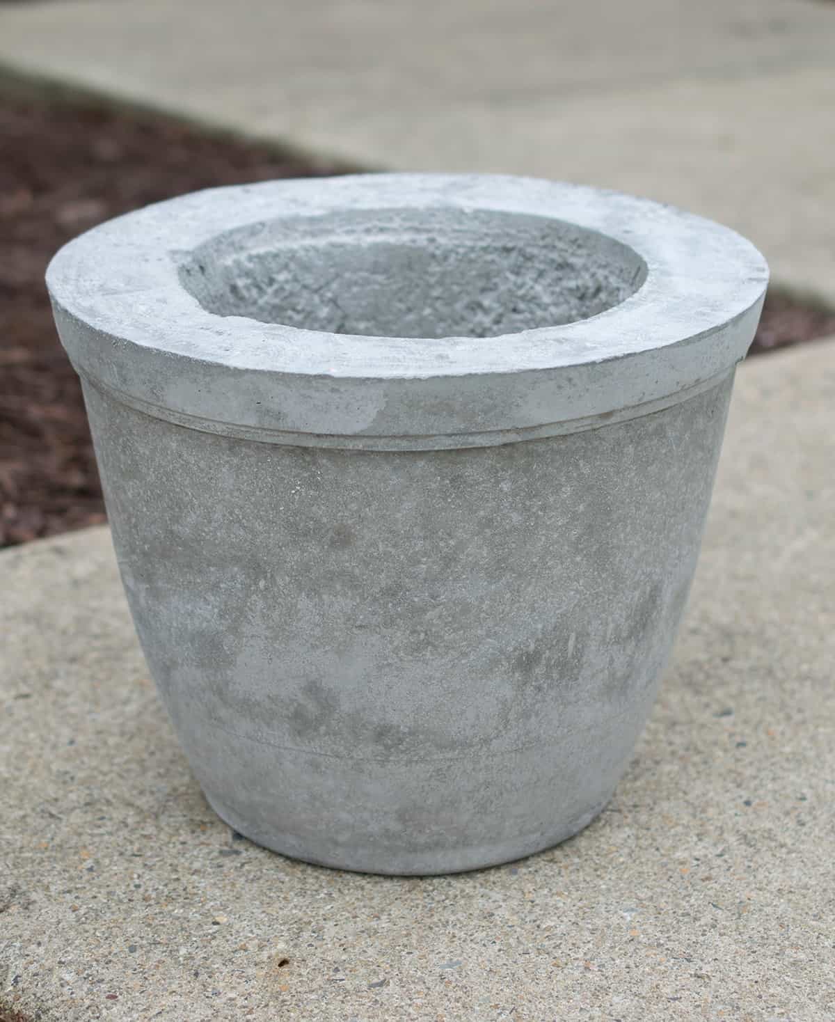 Concrete molded pot before painting.