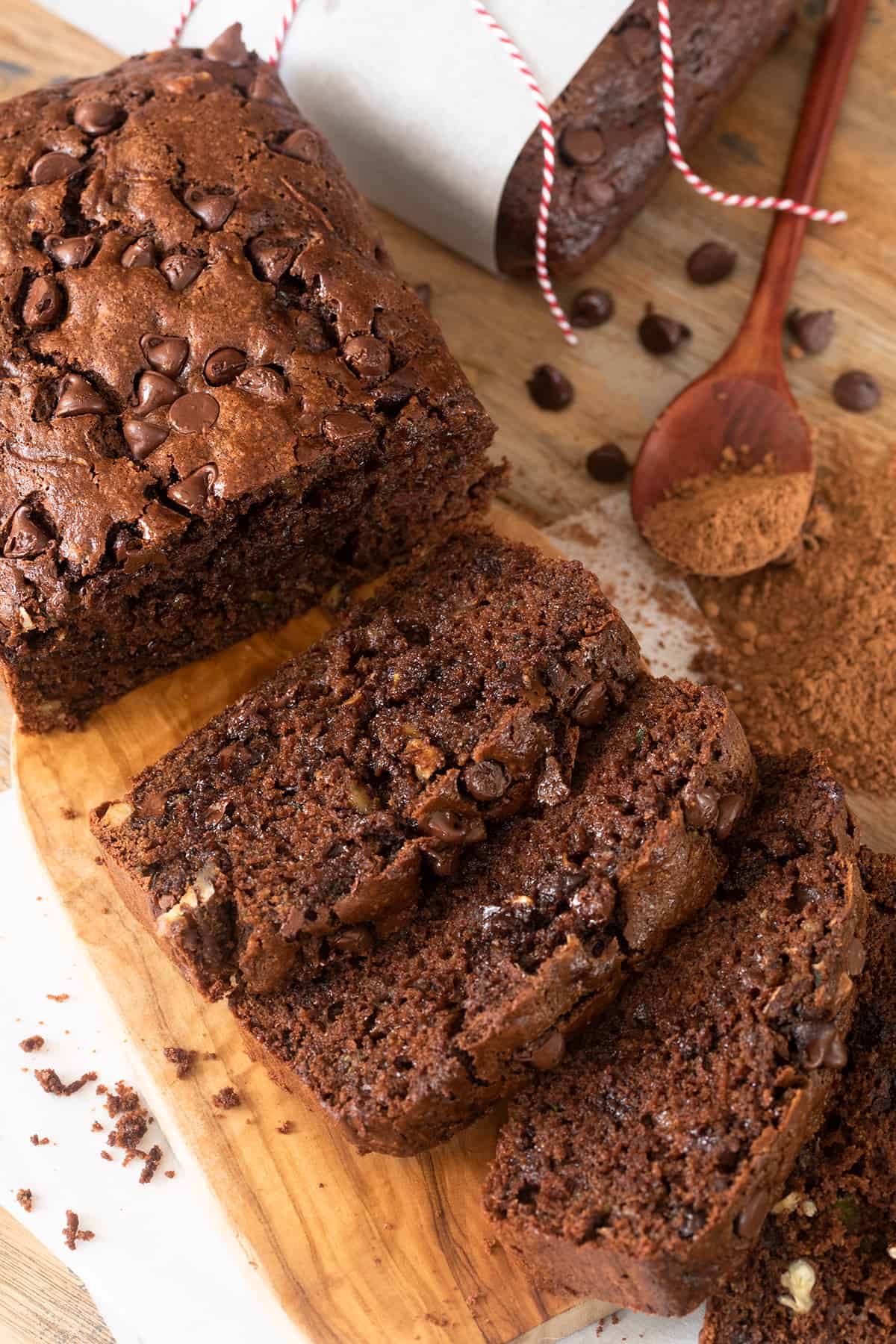 Double Chocolate Zucchini Bread sliced and laid out on a cutting board.
