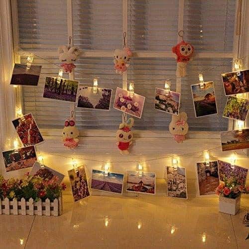 Picture hanging fairy lights for tween/teen bedrooms.
