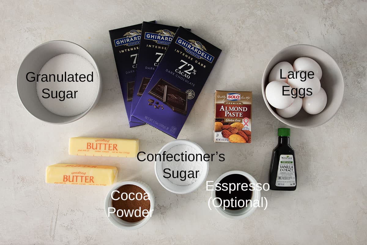 Flat lay of ingredients for gluten free chocolate cake with almond paste.