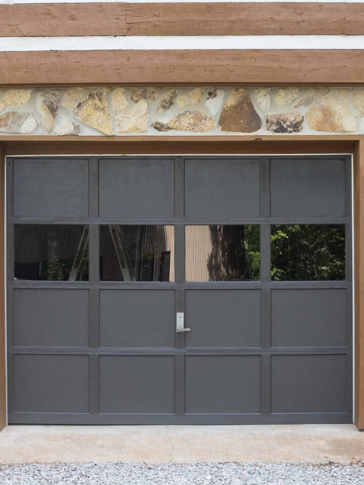 Gray garage door with windows.