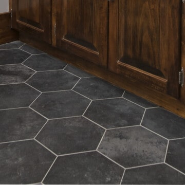 Closeup of vinyl peel and stick floor with groutable tile.