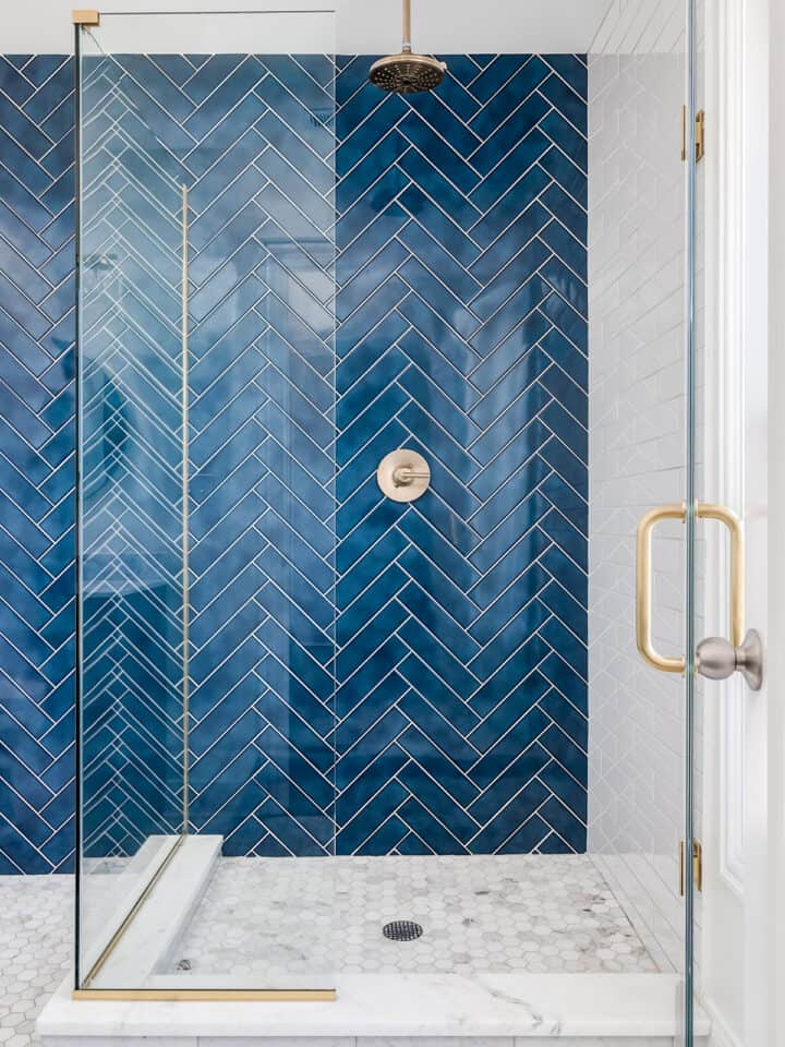 Blue herringbone shower wall focal point.