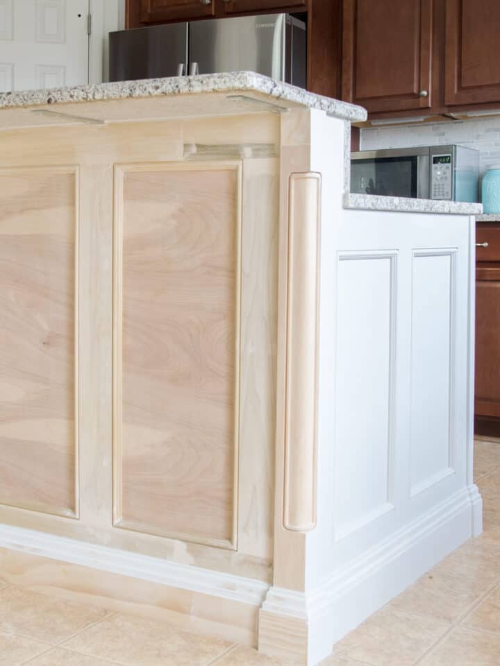 A kitchen island in the middle of building it.