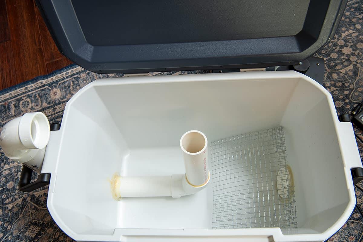 The inside of a DIY fog chiller design with pvc pipe and chicken wire.