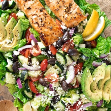 Salmon Avocado Salad with Mediterranean and Greek flavors on a platter.