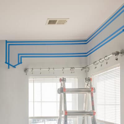 Horizontal painters tape stripes on the wall