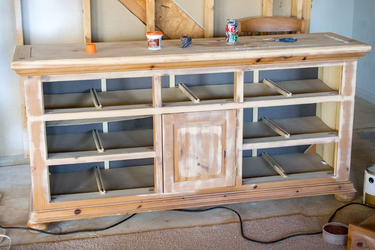 A dresser sanded to prep for painting.