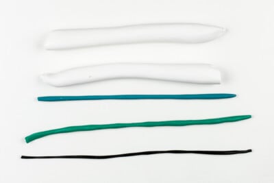 Polymer clay rolls with several rolls in a row.