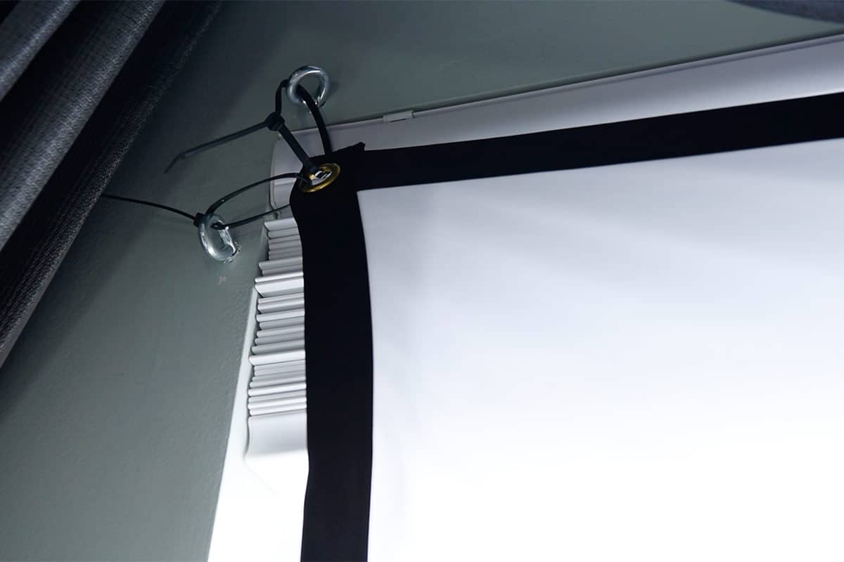 Projection screen corner shown how to hang a projector screen.