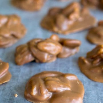 New Orleans Pecan Pralines Cookies cooling on wax paper.