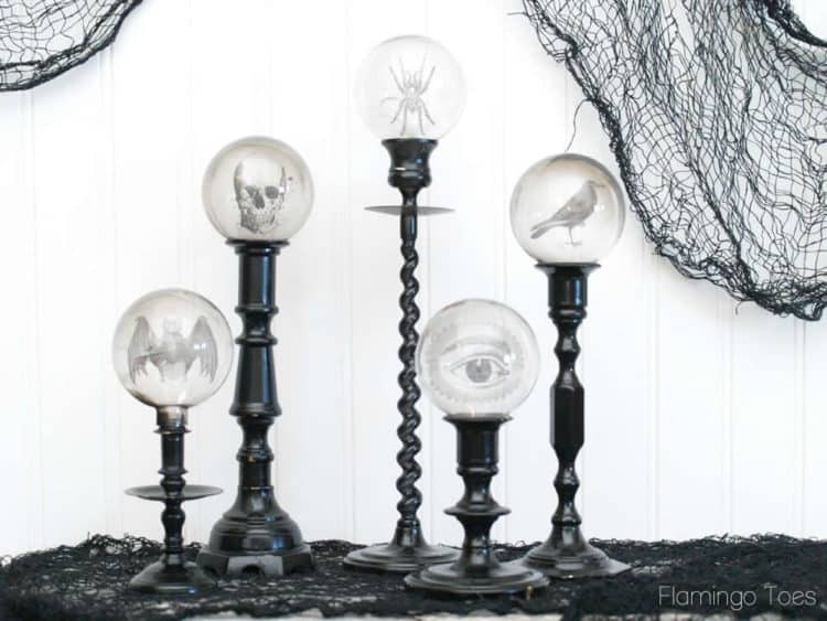 DIY candlesticks with images that glow inside of them.