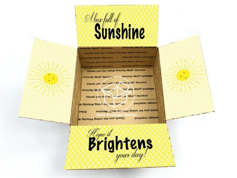 Open box with A box full of sunshine brightens your day written on the flaps.
