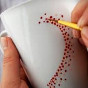 Painting ceramic coffee mugs with sharpies are not permanent! Today I am sharing a way to create those cute pinterest mugs that are actually dishwasher safe. These coffee mug crafts are for valentine's day, but who needs a holiday to create cute mugs.