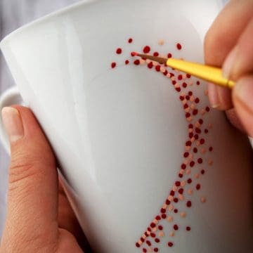 Painting ceramic coffee mugs with sharpies are not permanent! Today I am sharing a way to create those cute pinterest mugs that are actually dishwasher safe. These coffee mug crafts are for valentine's day, but who needs a holiday to create cute mugs.