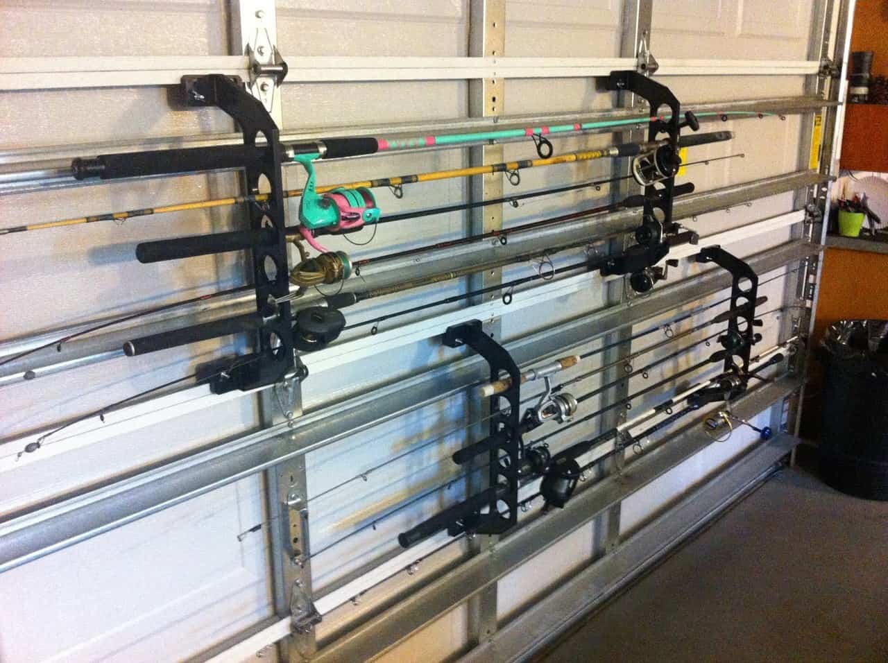 Fishing rod storage directly on a garage door.