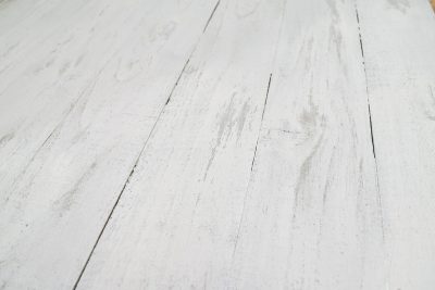 Creating a distressed wood background our of recycled wood. Grey and White chalkboard paint.