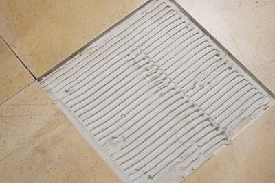 Thin set mortar put in to replace a floor tile.